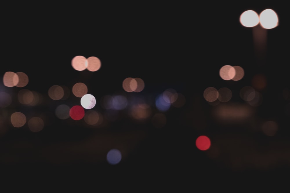 blurred photography of city lights