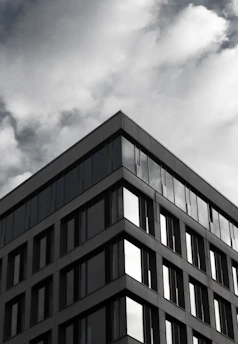 gray building under cloudy sky during daytime