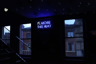 turned on more this way signage