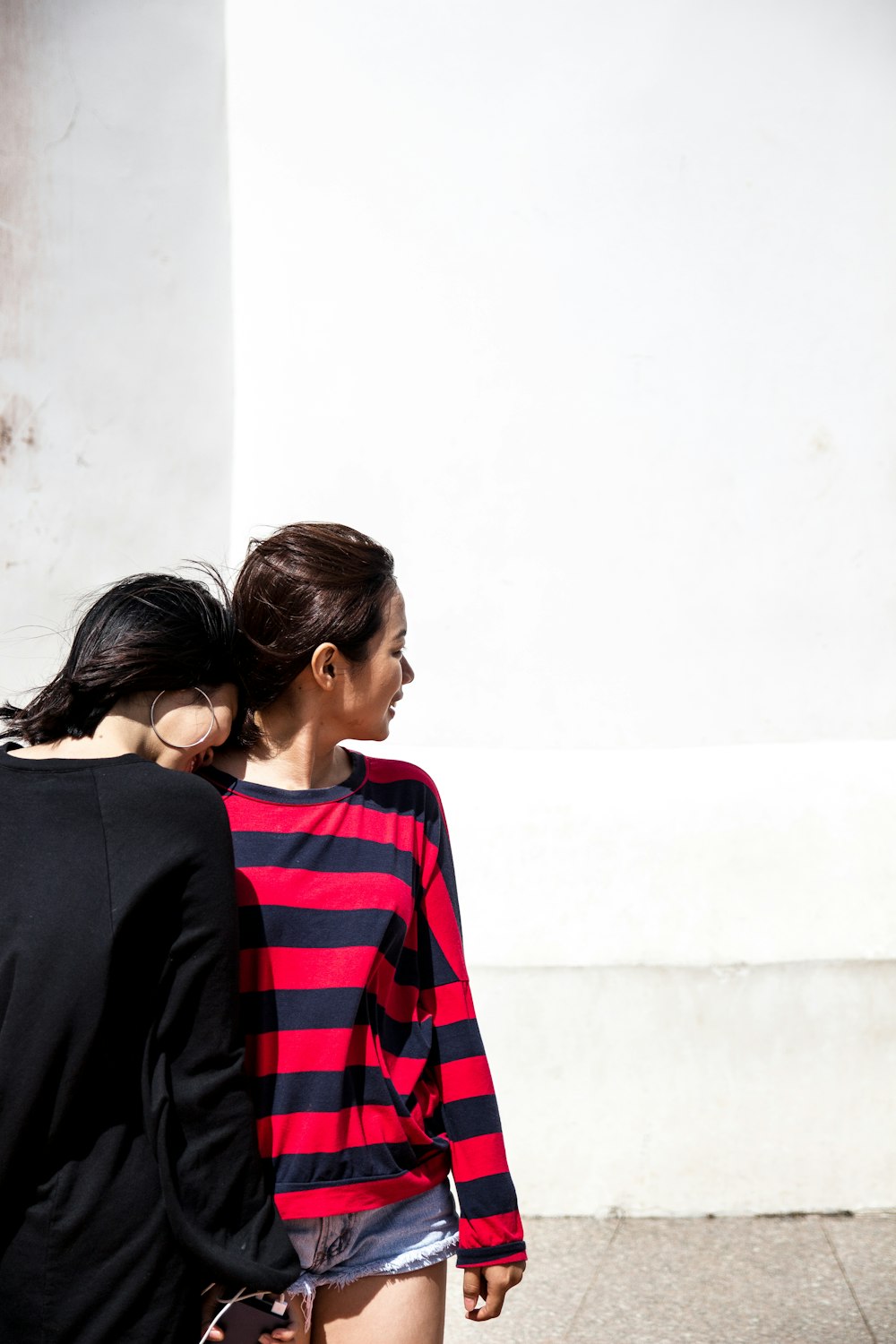 woman wearing black and red striped shirt