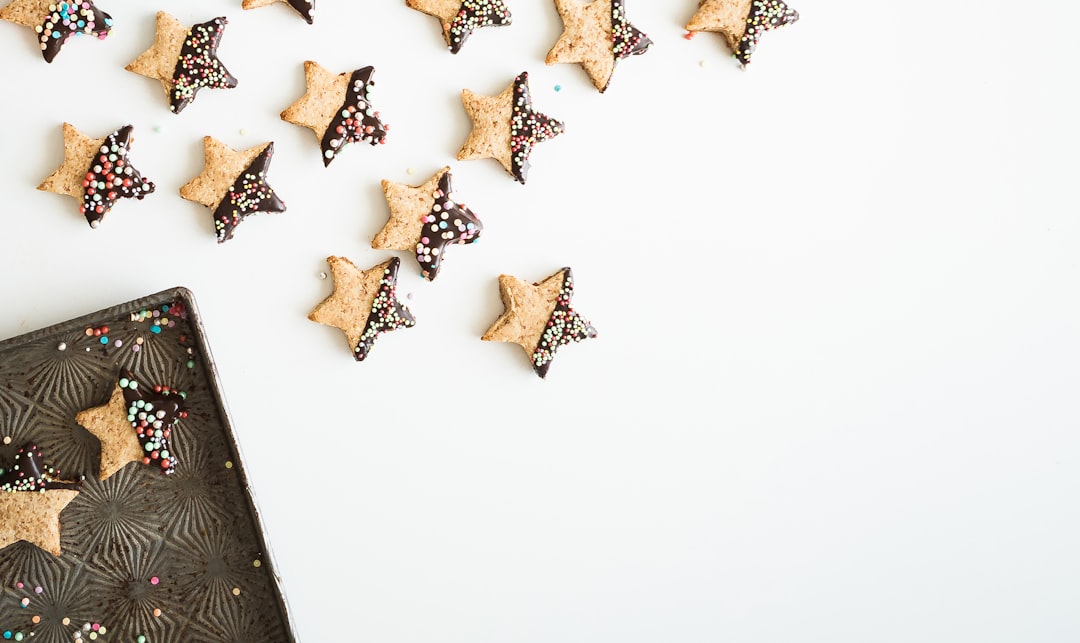 star-shape cookies with chocolate fillings, A batch of holiday shortbread stars makes for the most magical of evenings.