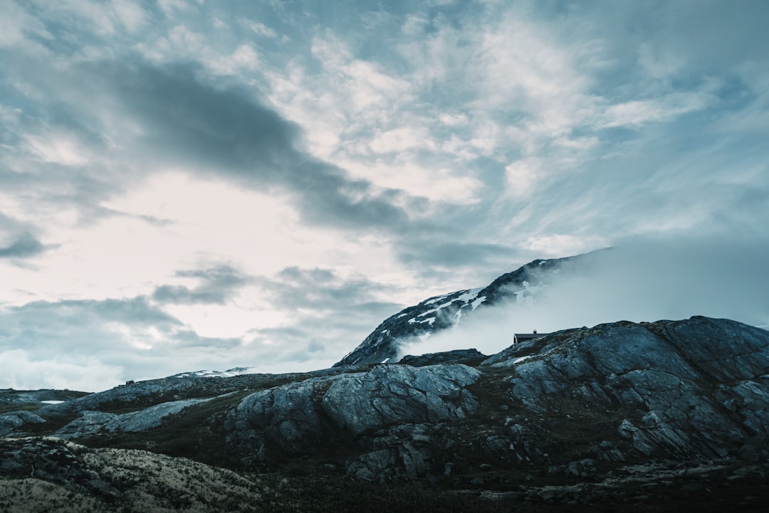 mountain covering with clouds