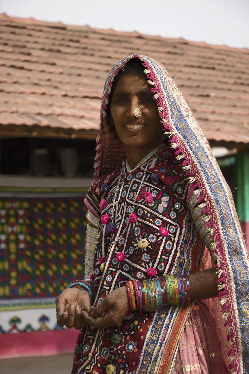A woman of Kutch in traditional mirrorwork dress
