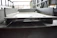 Close-up of a steel beam with precise detailing marks and measurements.