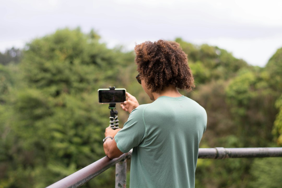 photography of man taking a selfie,