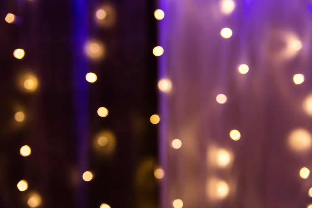 bokeh photography of white string lights