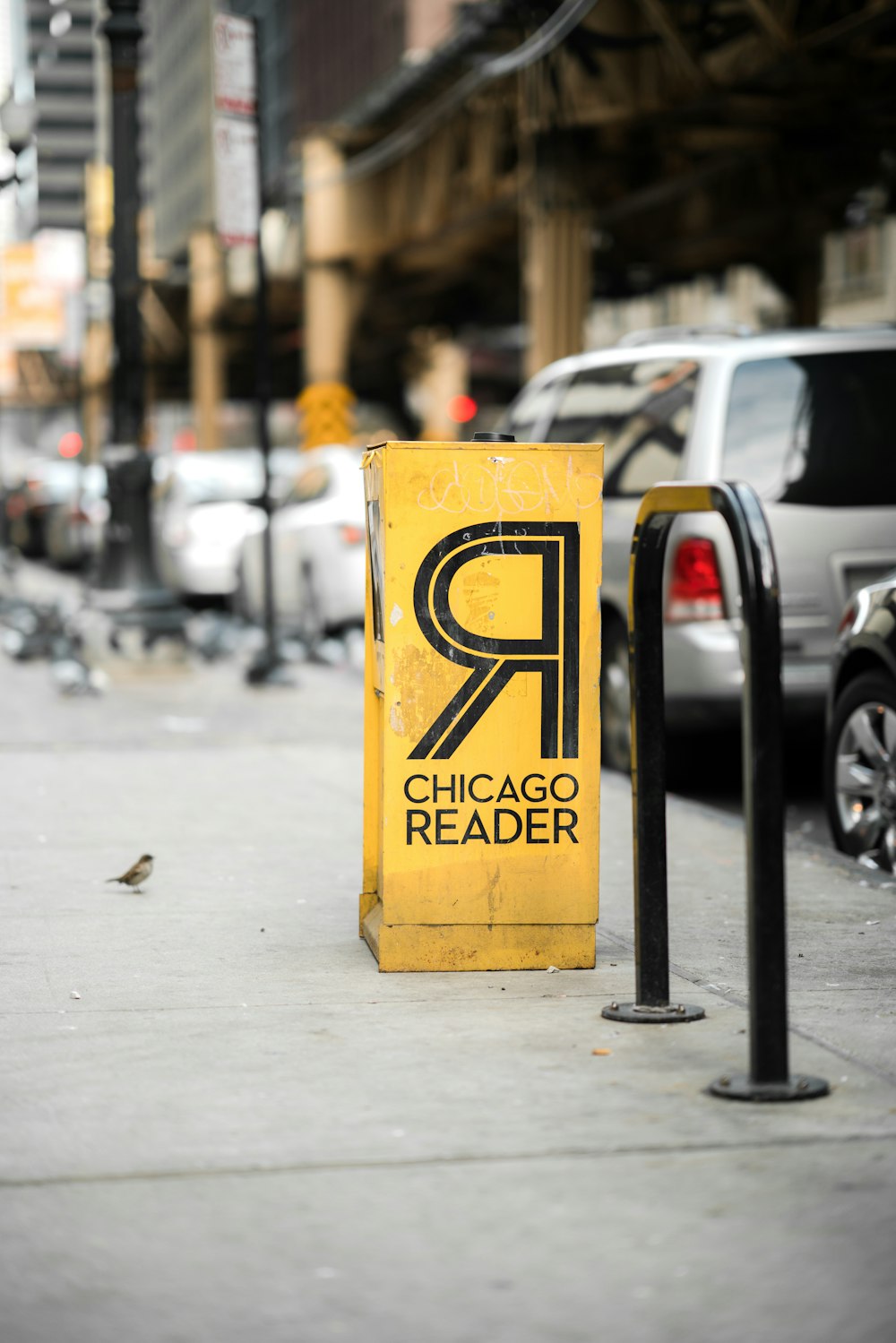 vehicle parked near Chicago Reader can at daytime