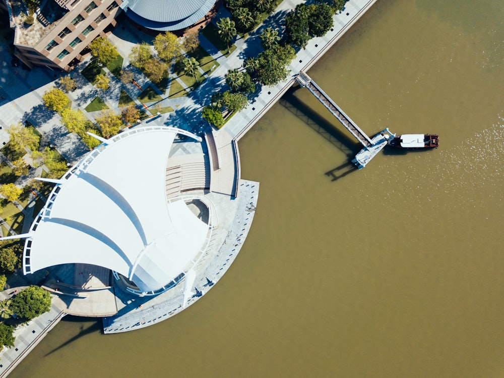 aerial photograph of a building near body of water