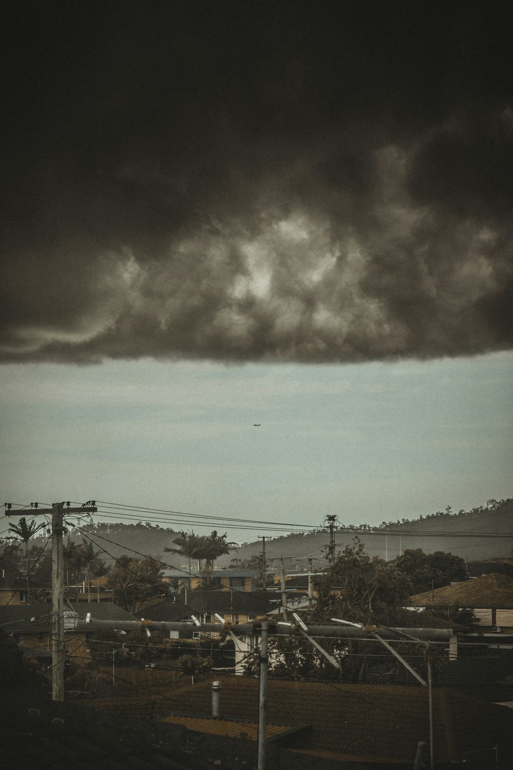 clouds over houses