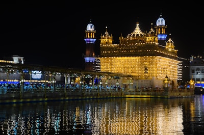 Trimbakeshwar Jyotirling temple glowing under early morning light with pilgrims.