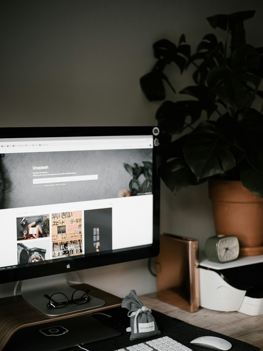 eyeglasses on black iMac