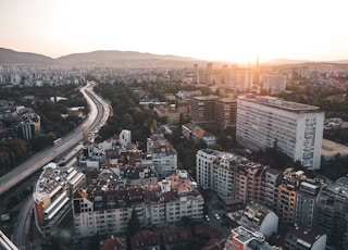 bird's-eye view of cityscape near road during daytime