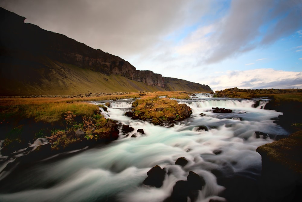 river next to mountains