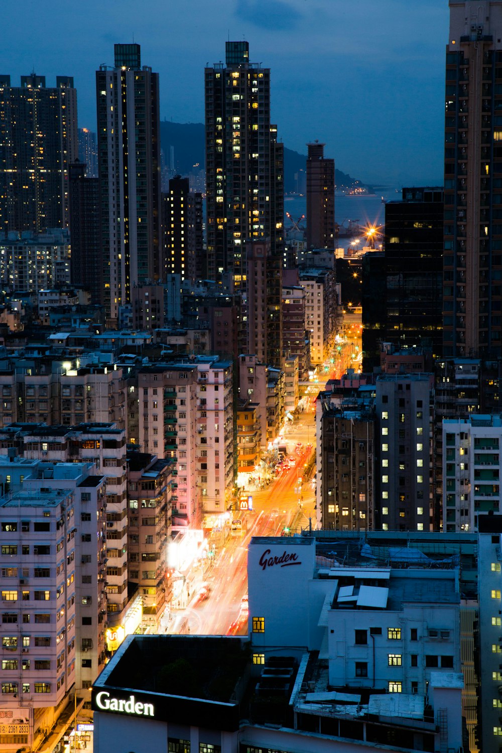 high rise photography of beige concrete buildings