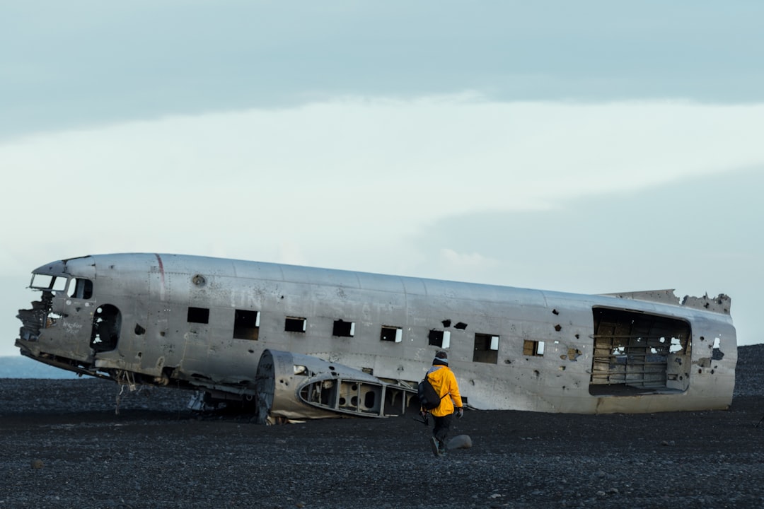woman walking carrying gray luggage, PlaneWreck