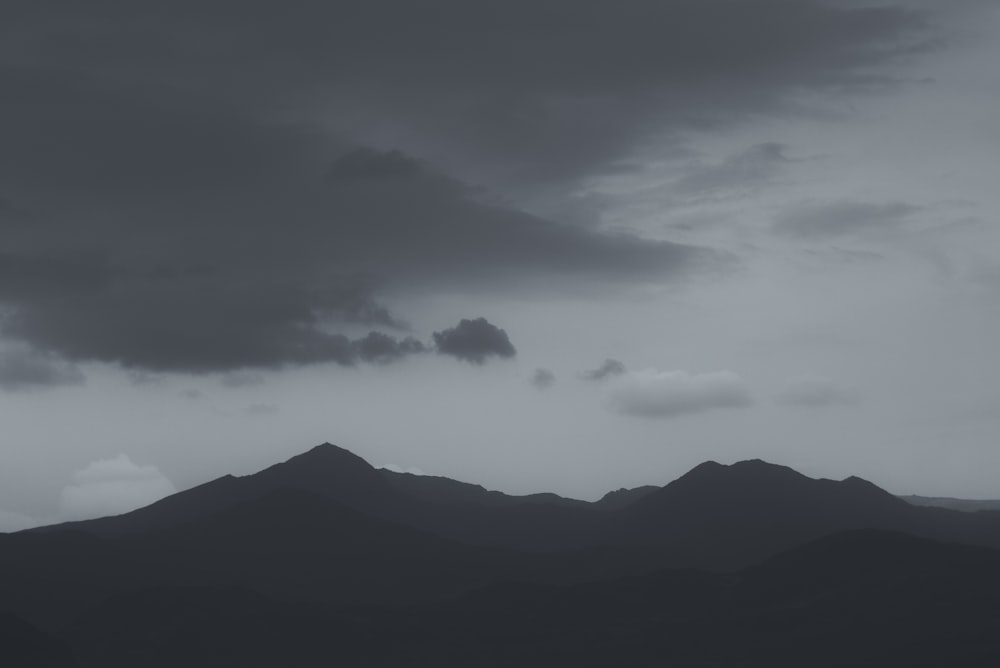 silhouette photography of mountain during daytime