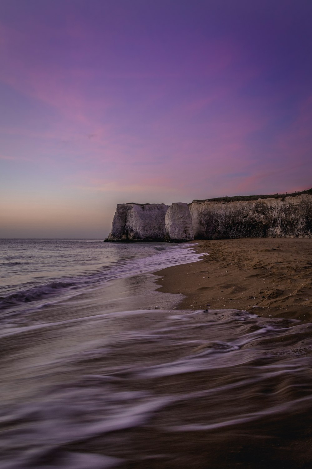 time lapse photography of seashore waves