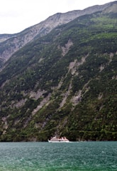 A scenic view of a boat on the water.