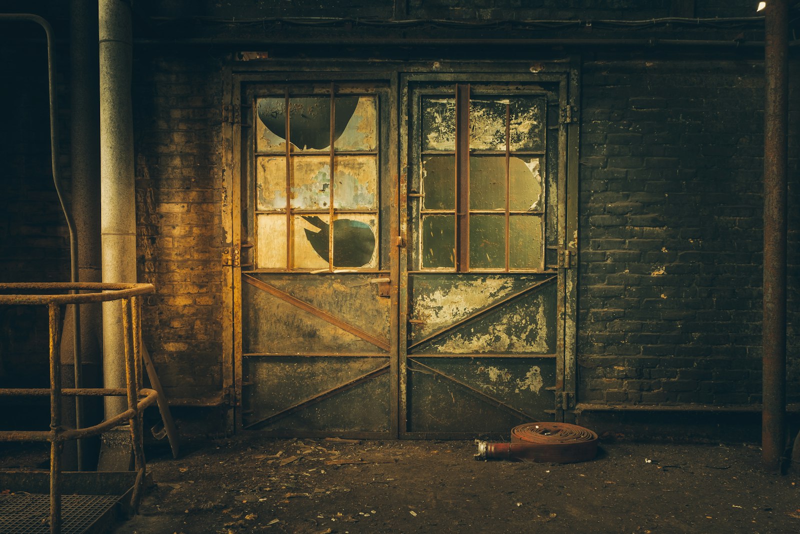 Fujifilm X-T2 + Fujifilm XF 16-55mm F2.8 R LM WR sample photo. Abandoned concrete building door photography