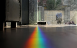 closeup photo of glass reflection rainbow light