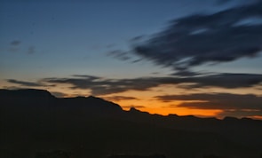 Sunset over the Montserrat mountain range with dramatic shadows.