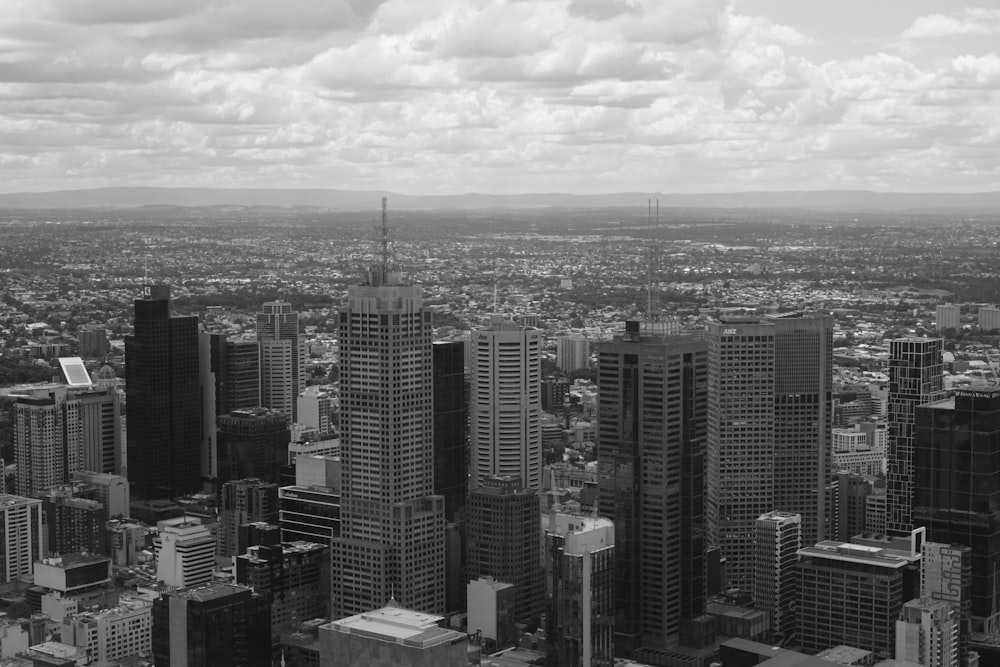grayscale photo of high-rise buildings