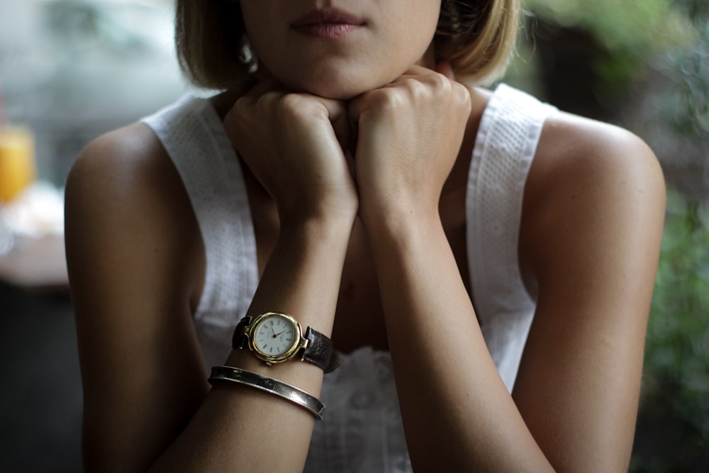 closeup photo of woman wearing white tank dress