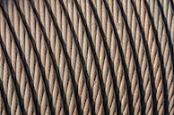 Tangled data cables transformed into neat loops, showcasing durability and flexibility.