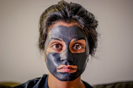 woman with gray facial mask