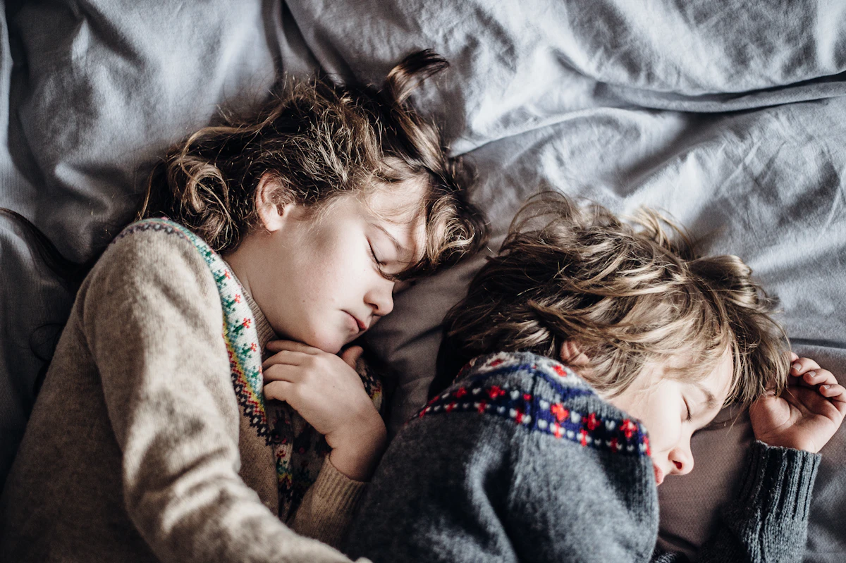 Parent reading to preschooler during bedtime routine