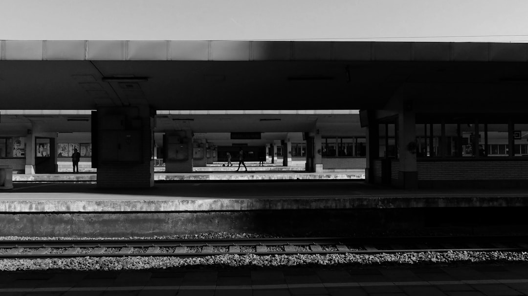 person walking in train station,