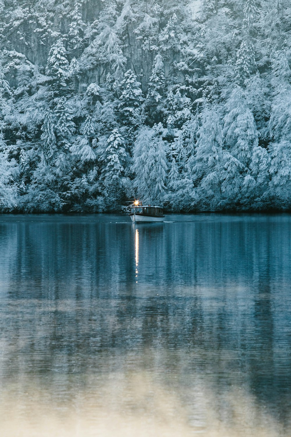 white sailing boat on river