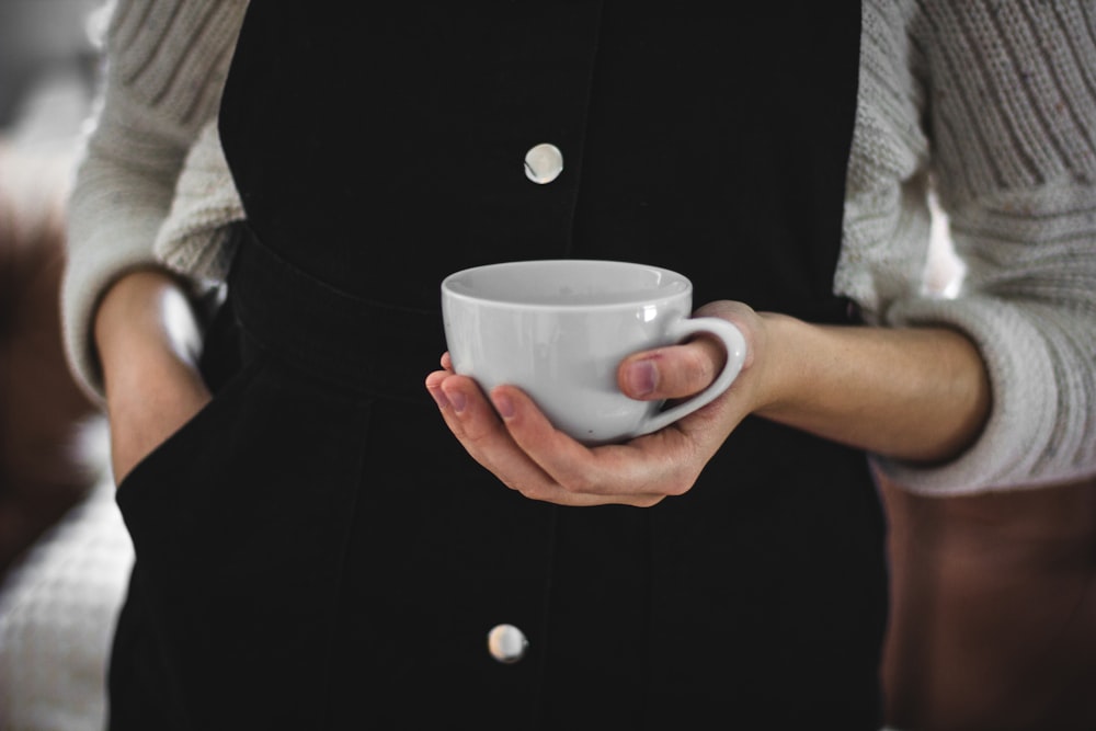 woman holding a cup