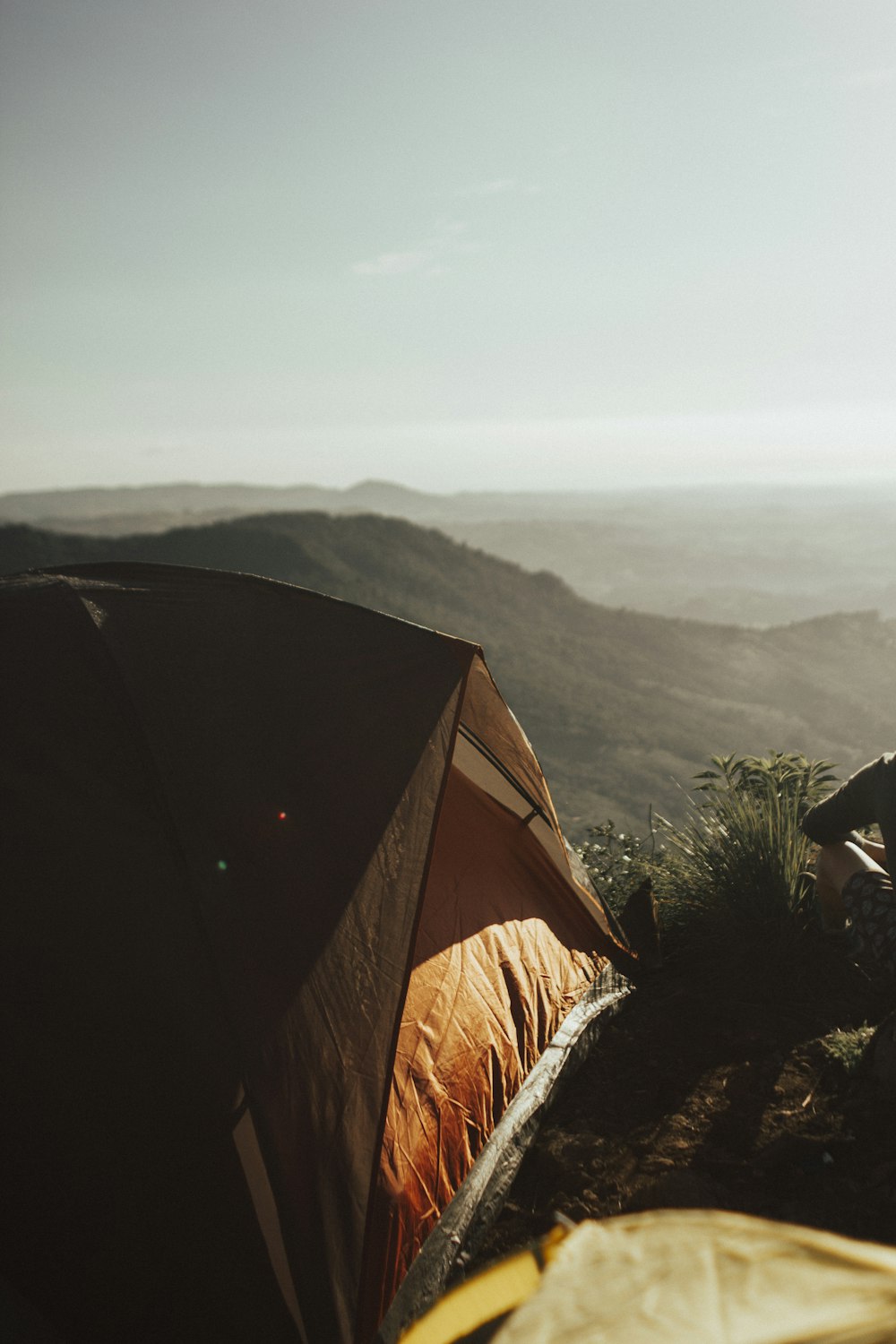 brown tent on moutains