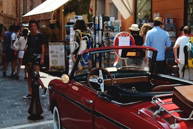 red convertible near bollard
