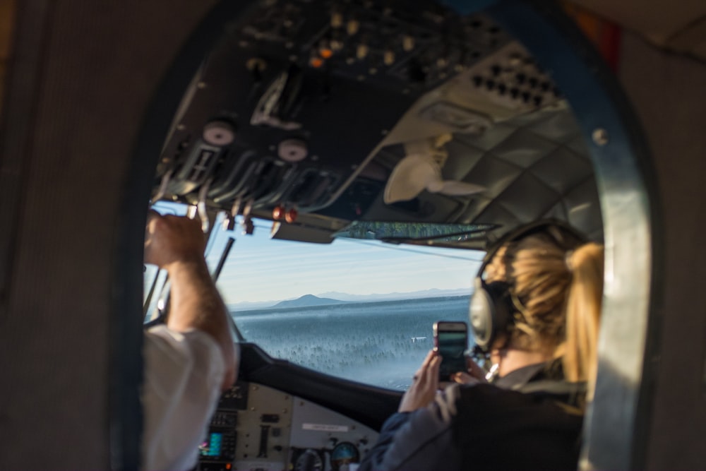 two person riding aircraft