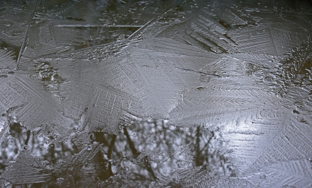 a close up of a rain covered window