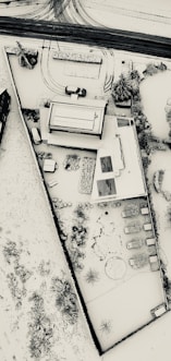 bird's eye photography of concrete building near road