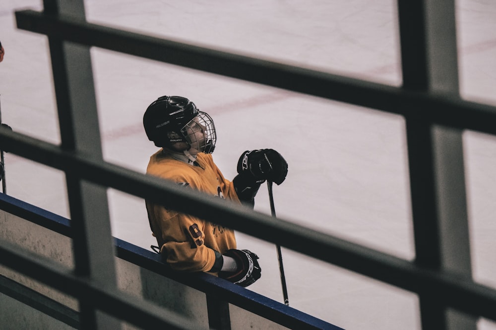 man inside ice hockey court