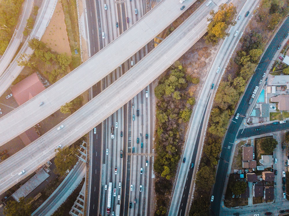 cars on roads and skyways during daytime