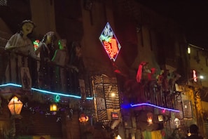View from the hotel window showing lively street and festive atmosphere.