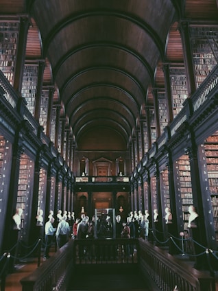 group of people inside library room