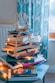 brown wooden framed candle holder on top of books