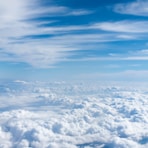 above-cloud photo of blue skies