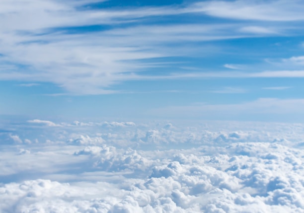 above-cloud photo of blue skies