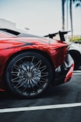 black and red Lamborghini Aventador SV rear left side