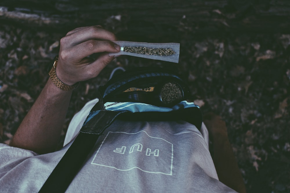 focus photo of person in gray T-shirt