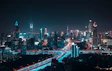 aerial photography of lightened city buildings at night time