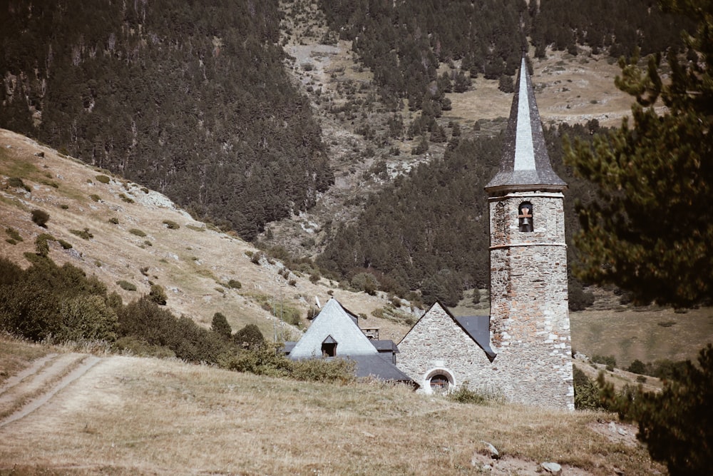 gray concrete building with tower at daytime