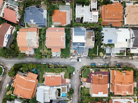 aerial drone view of residential rooftops for property inspection and assessment